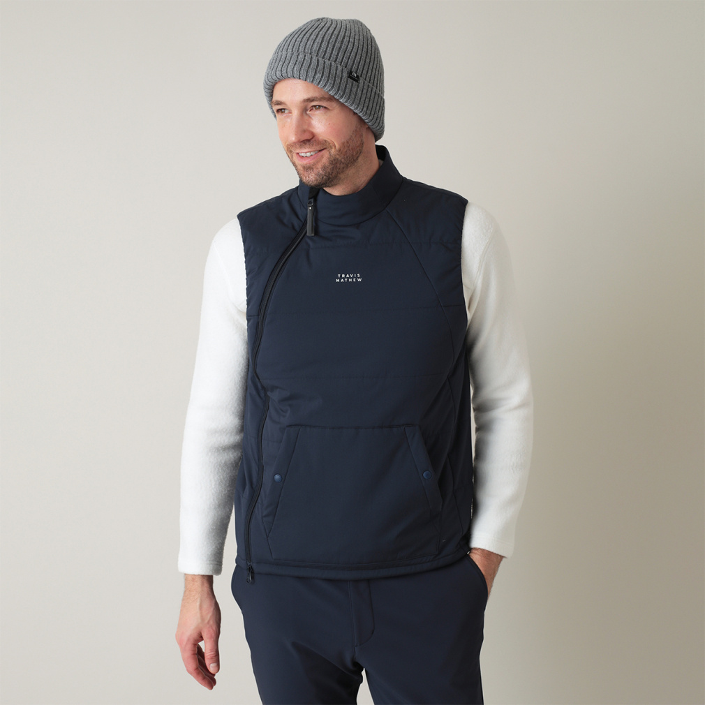 gBX}V[ StEFA ȃWPbg H ~ Padding Vest Y TravisMathew