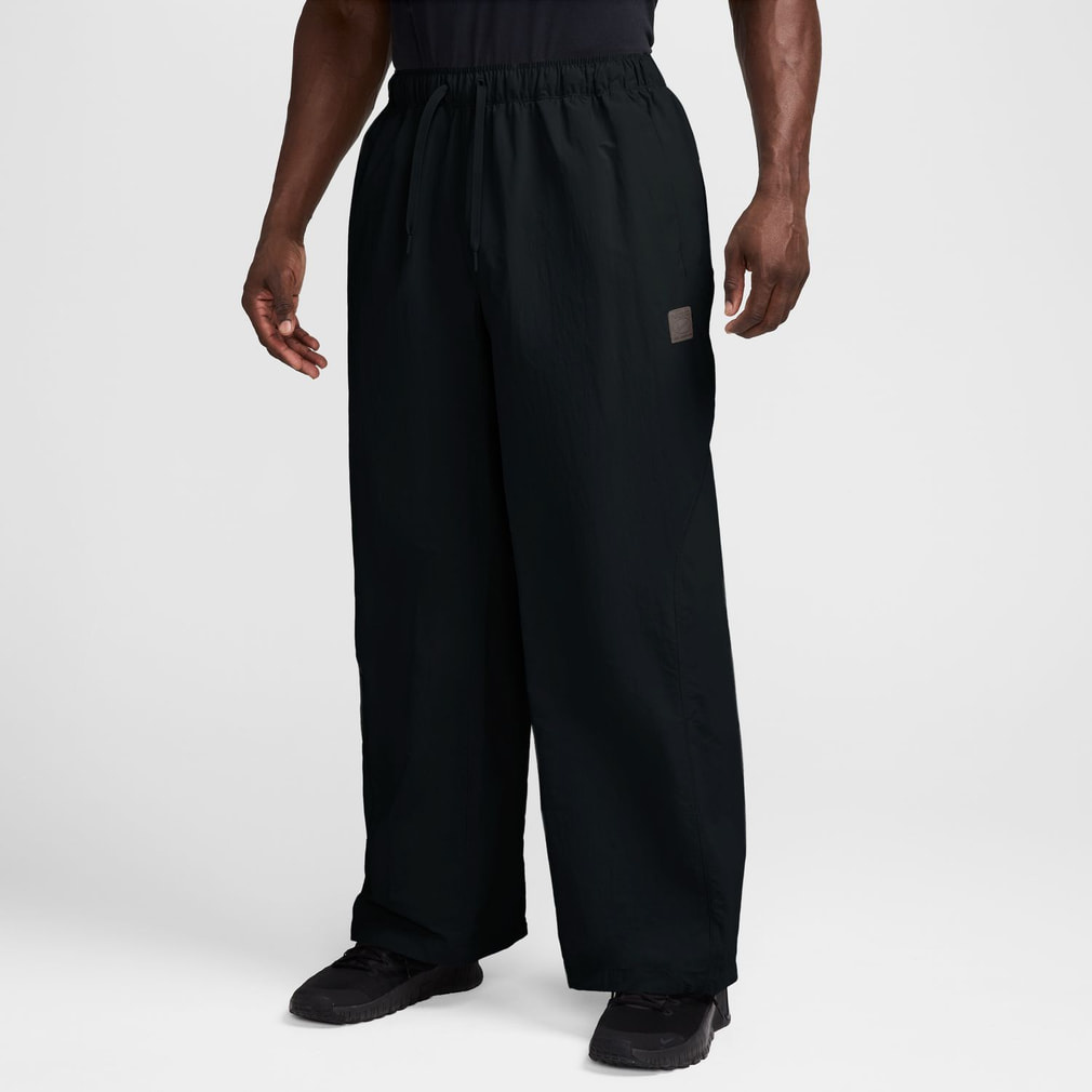 NIKE ナイキ　ランニング　ロングパンツ　左右非対称　限定 希少デザイン　新品 ナイキ メンズ ロングパンツ DF NAC オーバーサイズド ウーヴン パンツ